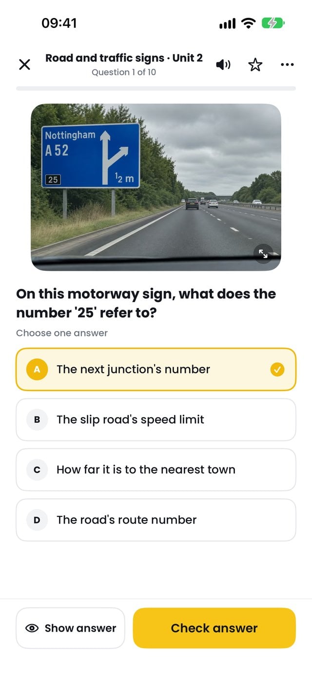 Lesson question showing a picture of a motorway sign with four answer options.